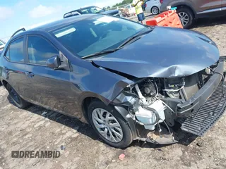 2018 Toyota Corolla L with VIN 2T1BURHE3JC049489, listed as a IAAI auction lot 42456500 with 98,788 mi miles and . Bid and sale history available at DreamBid. Image 1.