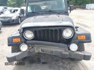 2001 Jeep Wrangler Sahara with VIN 1J4FA59S41P358035, listed as a IAAI auction lot 42685488 with 120,630 mi miles and . Bid and sale history available at DreamBid. Image 6.