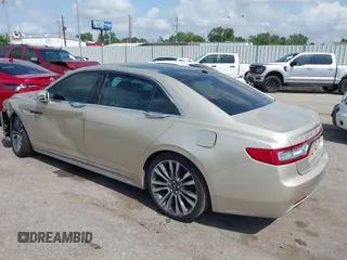 2017 Lincoln Continental Select z VIN 1LN6L9SK0H5631653, wystawiony jako IAAI lot #42092357 z przebiegiem Nie podano mil oraz . Historia ofert i sprzedaży dostępna na DreamBid. Obrazek 3.