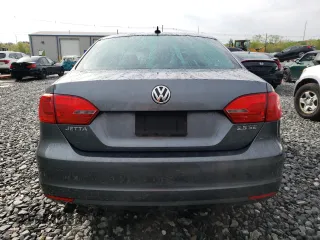 2013 Volkswagen Jetta SE z VIN 3VWDP7AJ4DM361292, wystawiony jako Copart lot #55861875 z przebiegiem 97 771 mil mil oraz Czysty tytuł • Clean title. Historia ofert i sprzedaży dostępna na DreamBid. Obrazek 6.