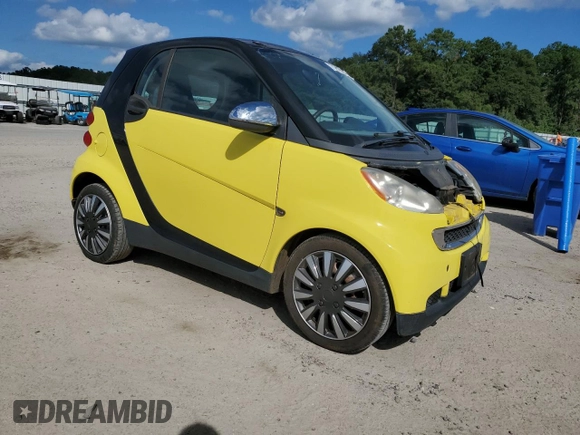 2010 Smart fortwo Pure z VIN WMEEJ3BAXAK371054, wystawiony jako Copart lot #71819294 z przebiegiem 103 177 mil mil oraz Szkoda całkowita • Salvage title. Historia ofert i sprzedaży dostępna na DreamBid. Obrazek 4.