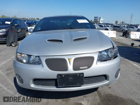 2005 Pontiac GTO with VIN 6G2VX12U05L369686, listed as a IAAI auction lot 41975716 with 64,893 mi miles. Bid and sale history available at carsss.com. Image 12.