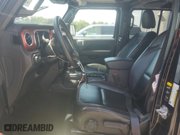 2022 Jeep Wrangler Unlimited Rubicon with VIN 1C4HJXFG1NW193437, listed as a Copart auction lot 57137365 with 56,732 mi miles and Salvage title. Bid and sale history available at DreamBid. Image 7.