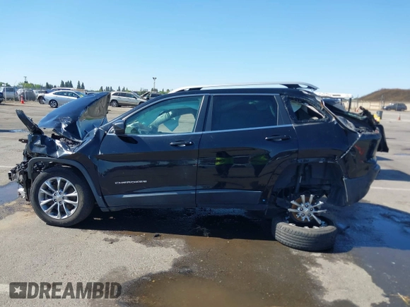 2019 Jeep Cherokee Latitude Plus with VIN 1C4PJLLB6KD154914, listed as a IAAI auction lot 42312708 with Not provided miles and . Bid and sale history available at DreamBid. Image 14.