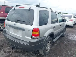 2005 Ford Escape XLT with VIN 1FMYU03185KE08782, listed as a IAAI auction lot 42158663 with 277,242 mi miles and . Bid and sale history available at DreamBid. Image 4.