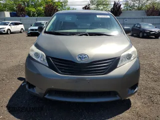 2012 Toyota Sienna with VIN 5TDZK3DC8CS198495, listed as a Copart auction lot 57335205 with 66,786 mi miles and Salvage title. Bid and sale history available at DreamBid. Image 5.