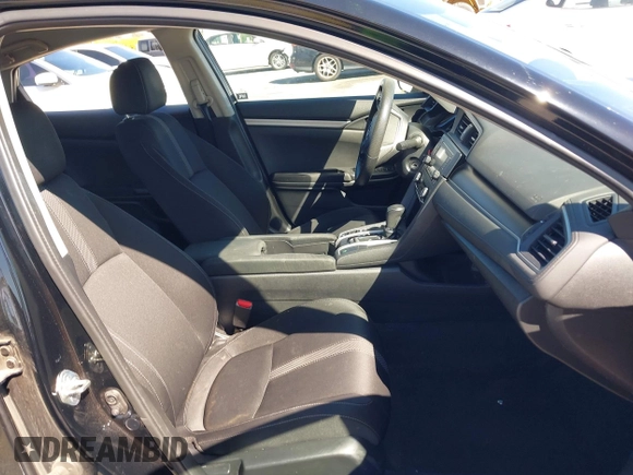 2020 Honda Civic LX z VIN 19XFC2F6XLE212683, wystawiony jako IAAI lot #41745743 z przebiegiem 81 553 mil mil oraz . Historia ofert i sprzedaży dostępna na DreamBid. Obrazek 5.
