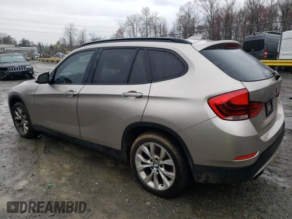 2014 BMW X1 xDrive28i with VIN WBAVL1C52EVY15236, listed as a Copart auction lot 50140885 with 141,088 mi miles and Salvage Title. Bid and sale history available at carsss.com. Image 2.