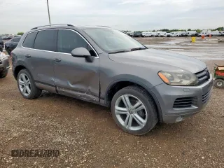 2011 Volkswagen Touareg Sport z VIN WVGFK9BP5BD001915, wystawiony jako Copart lot #58965625 z przebiegiem 181 765 mil mil oraz Szkoda całkowita • Salvage title. Historia ofert i sprzedaży dostępna na DreamBid. Obrazek 4.