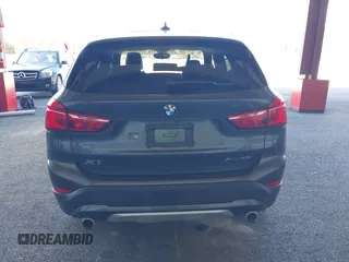 2021 BMW X1 xDrive28i with VIN WBXJG9C02M5T41170, listed as a IAAI auction lot 41886408 with 56,316 mi miles. Bid and sale history available at carsss.com. Image 17.