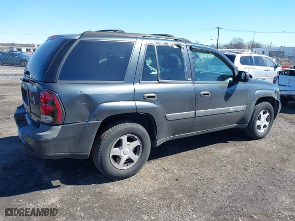 2004 Chevrolet TrailBlazer LS with VIN 1GNDT13S142391821, listed as a IAAI auction lot 41860650 with 184,915 mi miles. Bid and sale history available at carsss.com. Image 4.