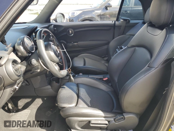 2016 MINI Convertible z VIN WMWWG5C53G3C18887, wystawiony jako Copart lot #51874965 z przebiegiem 78 102 mil mil oraz Szkody całkowita. Historia ofert i sprzedaży dostępna na DreamBid. Obrazek 7.
