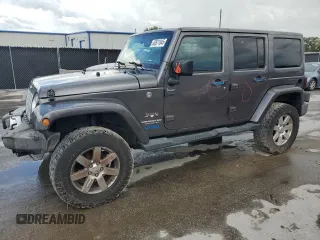 2016 Jeep Wrangler Unlimited 75th Anniversary with VIN 1C4BJWEG3GL216156, listed as a Copart auction lot 62611845 with 87,353 mi miles and Salvage title. Bid and sale history available at DreamBid. Image 1.