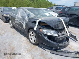 2015 Volkswagen CC R-Line with VIN WVWBP7AN9FE823240, listed as a IAAI auction lot 41697065 with Not Provided miles and . Bid and sale history available at DreamBid. Image 1.
