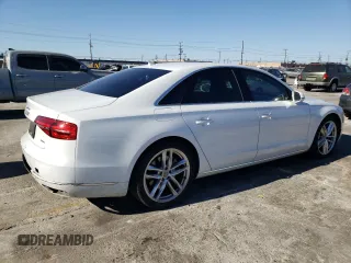 2015 Audi A8 с VIN WAUJGAFD3FN030568, выставлен на аукционе Copart как лот 75785923 с пробегом 83 911 миль миль и . История ставок и продаж доступна на DreamBid. Изображение 3.