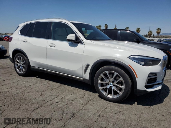 2019 BMW X5 xDrive40i with VIN 5UXCR6C52KLL35774, listed as a Copart auction lot 51802385 with 99,311 mi miles and Clean Title. Bid and sale history available at carsss.com. Image 4.