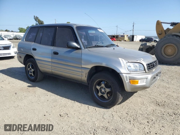 2000 Toyota RAV4 with VIN JT3GP10V2Y0052306, listed as a Copart auction lot 54726325 with 244,910 mi miles and Salvage title. Bid and sale history available at DreamBid. Image 4.