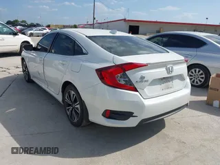 2017 Honda Civic EX-L z VIN 19XFC1F78HE008832, wystawiony jako IAAI lot #42455986 z przebiegiem 103 466 mil mil oraz . Historia ofert i sprzedaży dostępna na DreamBid. Obrazek 3.