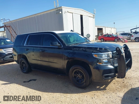 2015 Chevrolet Tahoe Commercial z VIN 1GNLC2EC7FR575386, wystawiony jako IAAI lot #41836137 z przebiegiem 143 231 mil mil oraz . Historia ofert i sprzedaży dostępna na DreamBid. Obrazek 13.