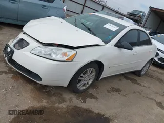 2006 Pontiac G6 6-Cyl z VIN 1G2ZG558364124834, wystawiony jako IAAI lot #41815411 z przebiegiem Nie podano mil oraz . Historia ofert i sprzedaży dostępna na DreamBid. Obrazek 16.