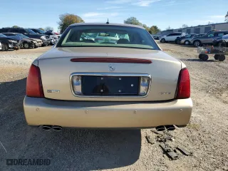 2005 Cadillac DeVille DHS with VIN 1G6KE57Y45U121085, listed as a Copart auction lot 80336744 with 115,068 mi miles and Salvage Title. Bid and sale history available at carsss.com. Image 6.