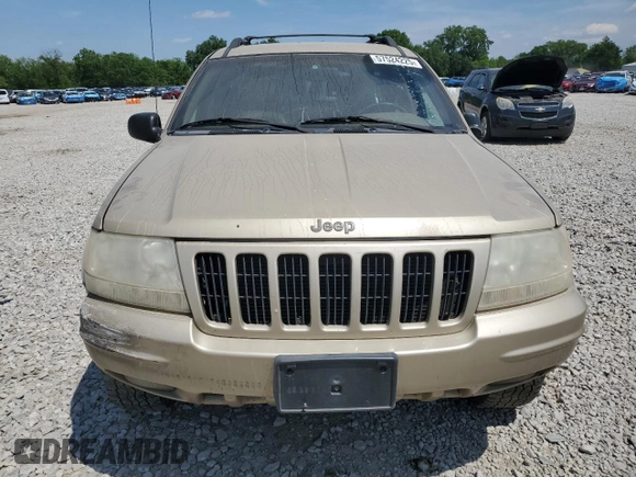 2000 Jeep Grand Cherokee Limited z VIN 1J4GW58N0YC272532, wystawiony jako Copart lot #57524225 z przebiegiem 238 921 mil mil oraz Szkoda całkowita • Salvage title. Historia ofert i sprzedaży dostępna na DreamBid. Obrazek 5.