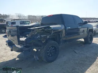 2018 Chevrolet Silverado 1500 Custom with VIN 3GCUKPEC4JG552699, listed as a IAAI auction lot 41774257 with 131,916 mi miles. Bid and sale history available at carsss.com. Image 4.