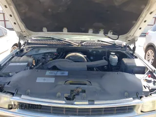 2005 Chevrolet Suburban LT z VIN 1GNEC16ZX5J100236, wystawiony jako IAAI lot #41920678 z przebiegiem 221 124 mil mil oraz . Historia ofert i sprzedaży dostępna na DreamBid. Obrazek 10.