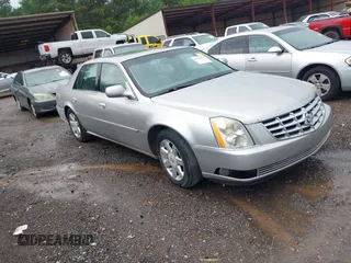 2007 Cadillac DTS Luxury I z VIN 1G6KD57Y17U180455, wystawiony jako IAAI lot #42224271 z przebiegiem 137 626 mil mil oraz . Historia ofert i sprzedaży dostępna na DreamBid. Obrazek 1.
