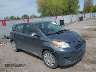 2010 Scion xD with VIN JTKKU4B42A1001367, listed as a IAAI auction lot 42085217 with 120,359 mi miles. Bid and sale history available at carsss.com. Image 1.