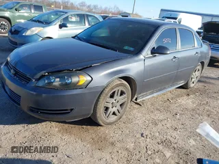 2013 Chevrolet Impala LT with VIN 2G1WB5E31D1161190, listed as a IAAI auction lot 41885072 with 143,442 mi miles and . Bid and sale history available at DreamBid. Image 2.
