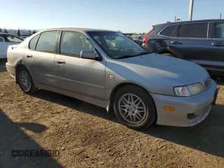 2001 Infiniti G20 Luxury z VIN JNKCP11A01T400404, wystawiony jako Copart lot #69899274 z przebiegiem 243 332 mil mil oraz Szkody całkowita. Historia ofert i sprzedaży dostępna na DreamBid. Obrazek 4.