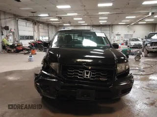 2013 Honda Ridgeline Sport with VIN 5FPYK1F77DB001247, listed as a IAAI auction lot 42346926 with 187,565 mi miles and . Bid and sale history available at DreamBid. Image 12.