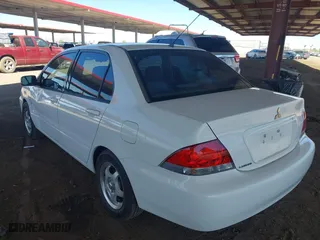 2004 Mitsubishi Lancer ES with VIN JA3AJ26E14U065498, listed as a IAAI auction lot 41887945 with 142,632 mi miles. Bid and sale history available at carsss.com. Image 3.