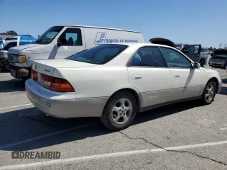 1998 Lexus ES 300 с VIN JT8BF28G8W5013500, выставлен на аукционе Copart как лот 49541405 с пробегом 146 355 миль миль и Списание • Salvage title. История ставок и продаж доступна на DreamBid. Изображение 3.