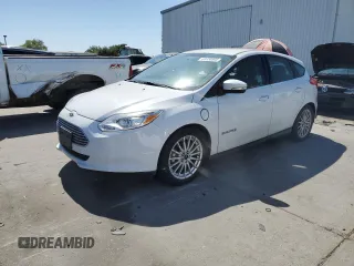 2016 Ford Focus Electric with VIN 1FADP3R47GL216219, listed as a Copart auction lot 63930905 with 93,985 mi miles and Clean title. Bid and sale history available at DreamBid. Image 1.