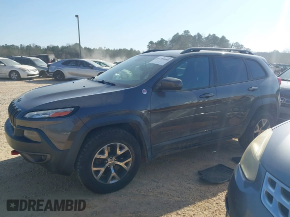 2014 Jeep Cherokee Trailhawk with VIN 1C4PJMBS6EW278987, listed as a IAAI auction lot 41789868 with 136,696 mi miles. Bid and sale history available at carsss.com. Image 15.