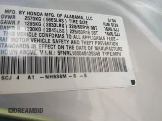 2004 Honda Odyssey LX with VIN 5FNRL18504B129349, listed as a IAAI auction lot 42393492 with 243,232 mi miles and . Bid and sale history available at DreamBid. Image 9.