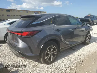 2023 Lexus RX with VIN 2T2BAMBA6PC007114, listed as a Copart auction lot 52264274 with 10,728 mi miles and Salvage Title. Bid and sale history available at carsss.com. Image 3.