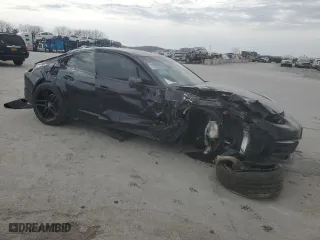 2023 Porsche Panamera with VIN WP0AJ2A71PL100545, listed as a Copart auction lot 47196065 with 24,195 mi miles and Salvage Title. Bid and sale history available at carsss.com. Image 4.
