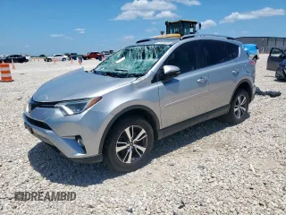 2018 Toyota RAV4 XLE with VIN JTMWFREV8JJ168501, listed as a Copart auction lot 61465685 with 95,716 mi miles and Salvage title. Bid and sale history available at DreamBid. Image 1.
