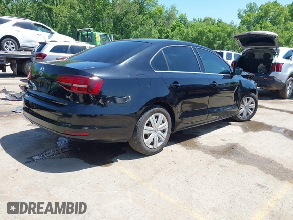 2017 Volkswagen Jetta S with VIN 3VW2B7AJ1HM329900, listed as a IAAI auction lot 42213125 with 124,556 mi miles and . Bid and sale history available at DreamBid. Image 4.