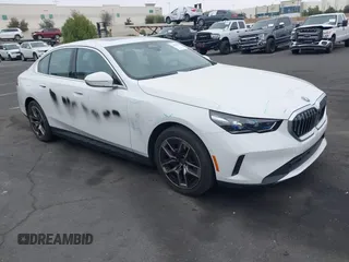 2024 BMW i5 eDrive40 with VIN WBY33FK03RCR99079, listed as a IAAI auction lot 42028540 with 28,827 mi miles and . Bid and sale history available at DreamBid. Image 13.