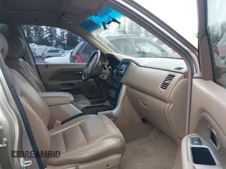 2006 Honda Pilot EX-L with VIN 2HKYF18706H529579, listed as a IAAI auction lot 41861069 with 222,641 mi miles and . Bid and sale history available at DreamBid. Image 5.