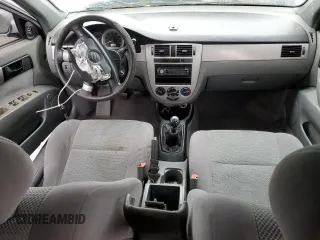 2006 Suzuki Forenza z VIN KL5JD56Z76K411376, wystawiony jako Copart lot #82751694 z przebiegiem Nie podano mil oraz Szkody całkowita. Historia ofert i sprzedaży dostępna na DreamBid. Obrazek 8.