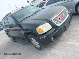 2004 GMC Envoy SLE with VIN 1GKDS13SX42398363, listed as a IAAI auction lot 42154134 with 308,001 mi miles. Bid and sale history available at carsss.com. Image 1.