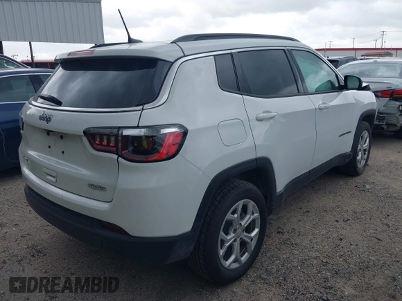 2024 Jeep Compass Latitude with VIN 3C4NJDBN9RT100598, listed as a IAAI auction lot 42541564 with 25,447 mi miles and . Bid and sale history available at DreamBid. Image 4.