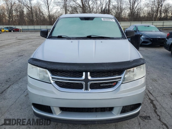 2013 Dodge Journey American Value with VIN 3C4PDCAB9DT604157, listed as a Copart auction lot 48206675 with 158,392 mi miles and Salvage Title. Bid and sale history available at DreamBid. Image 5.