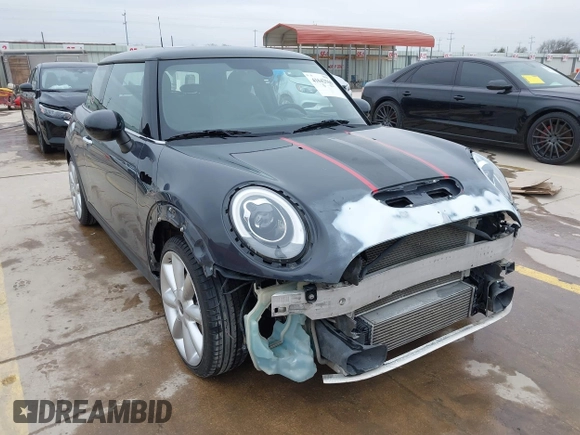 2014 MINI Hardtop S with VIN WMWXM7C56ET926604, listed as a IAAI auction lot 41642560 with 81,219 mi miles and . Bid and sale history available at DreamBid. Image 1.