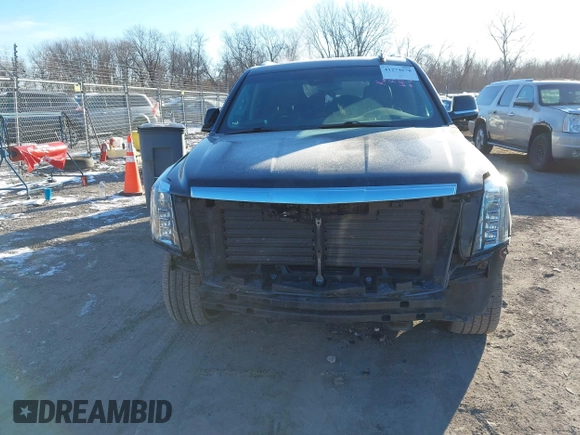 2018 Cadillac Escalade ESV Luxury z VIN 1GYS4HKJ2JR381357, wystawiony jako IAAI lot #41274678 z przebiegiem 173 401 mil mil oraz . Historia ofert i sprzedaży dostępna na DreamBid. Obrazek 13.